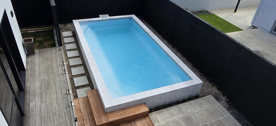 Bayside fibreglass pool model installed and filled, ready to view